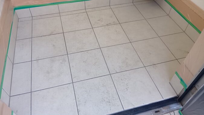 施工前の玄関タイル